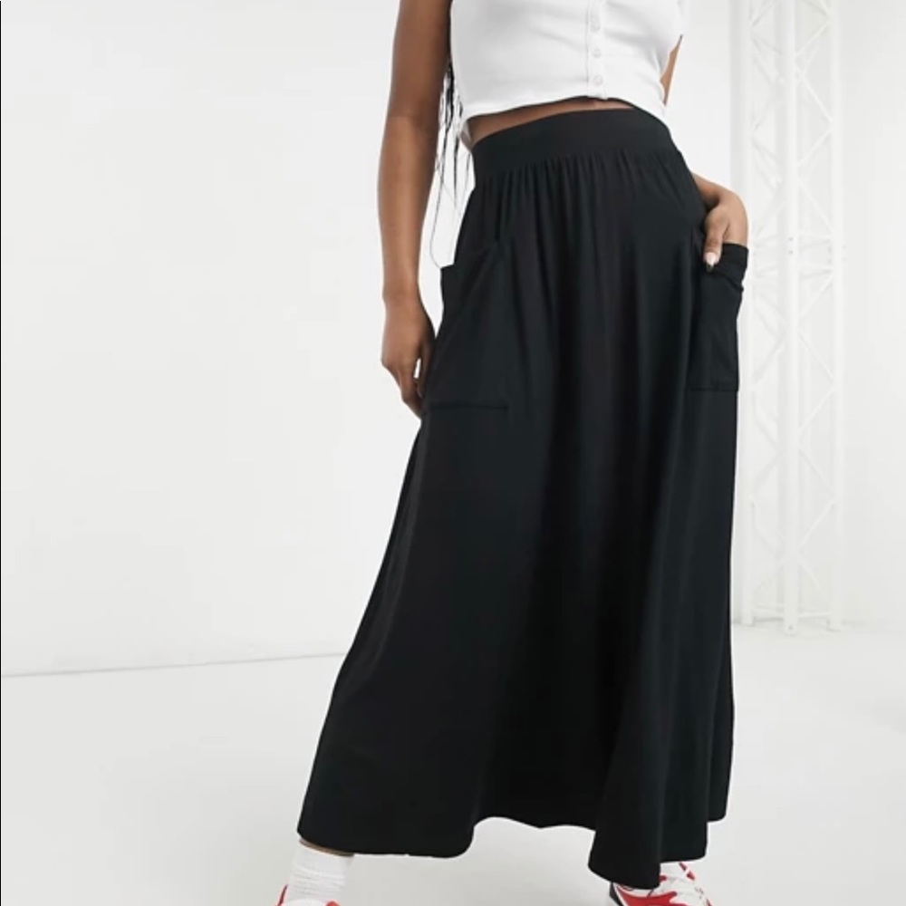 ASOS DESIGN midi skirt with pockets in black